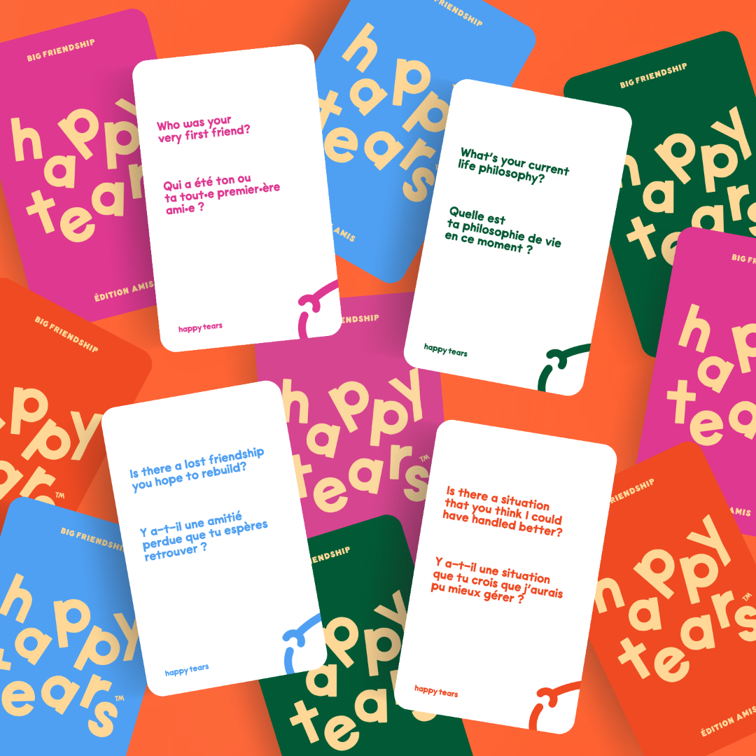 Set of 'Happy Tears' cards on a colorful background