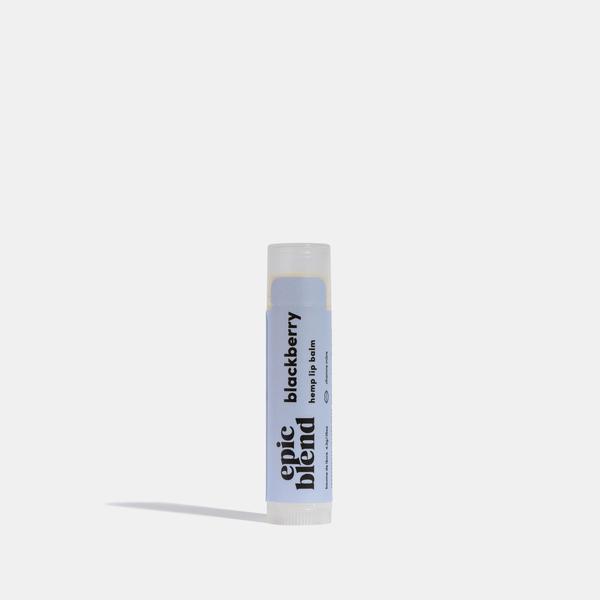 A white tube of Epic Blend Blackberry Hemp Lip Balm with a light purple label. The label displays the brand name, "blackberry hemp lip balm," and a net weight of 4.2g.