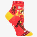 A pair of red ankle socks with yellow accents. One sock features a vintage-style illustration of a cowgirl riding a horse, with "Boss Lady" text above and "Giddy Up" below. The other sock shows the back of the cowgirl and horse with the "Giddy Up" text.
