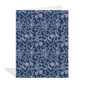 Floral patterned card with white flowers on a blue background