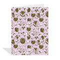 Greeting card with a floral pattern on a light purple background