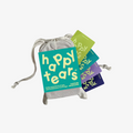 Happy Tears Family Edition deck, Ottawa. Grey linen pouch, rainbow-coloured cards. 'Happy Tears' logo, bilingual text: 'Family connection for all ages', 'Liens familiales pour tous les ages'. Local Ottawa board games.