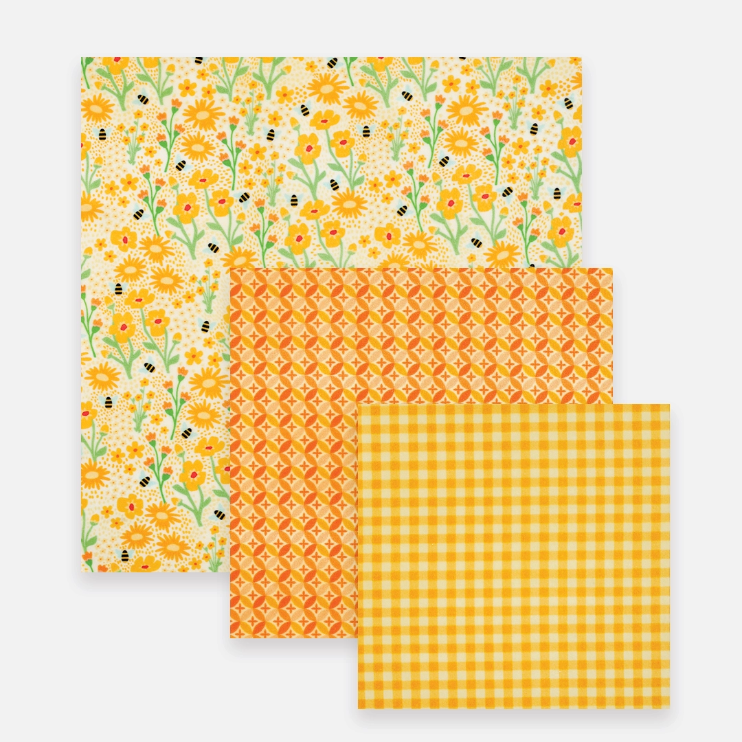 Yellow Beeswax Wrap Variety Set is a set of 3 beeswax food wraps in small, medium and large.