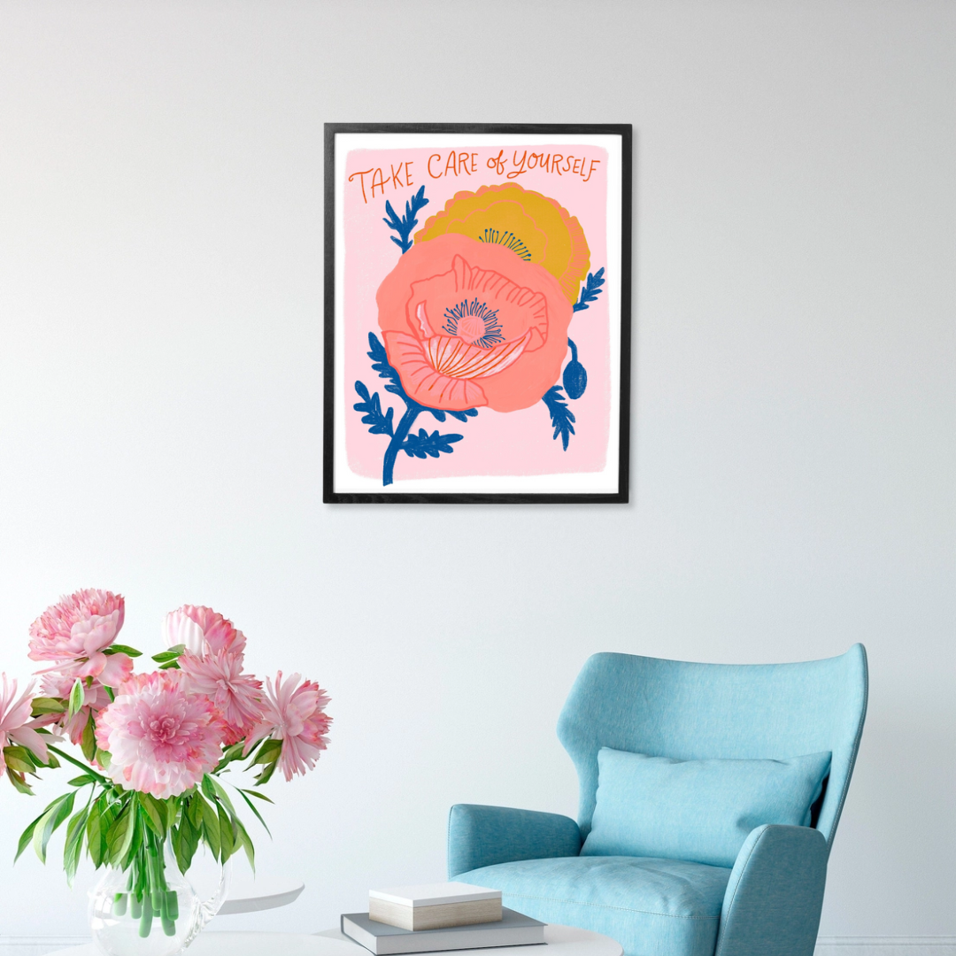 Take Care of Yourself Framed Art Print, an art print of two colourful flowers with the words "take care of yourself" above on a pink background, in a black frame.