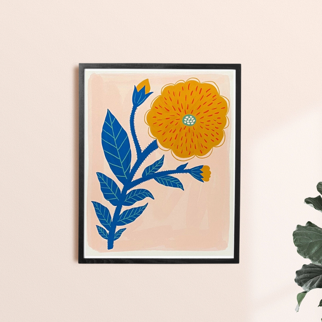 Yellow Flower Framed Art Print, a poster of a yellow flower on a peachy background in a black frame.