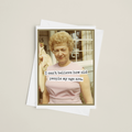 Greeting card with a photo of an elderly woman and humorous text on a beige background